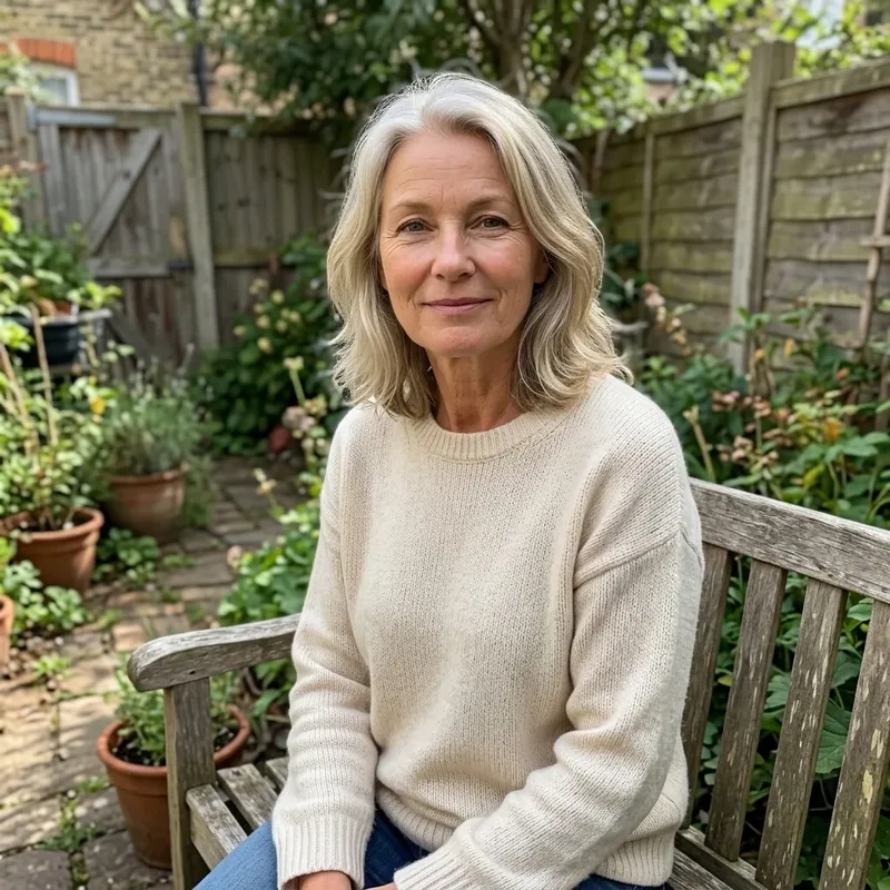 Woman sitting in a sunny garden